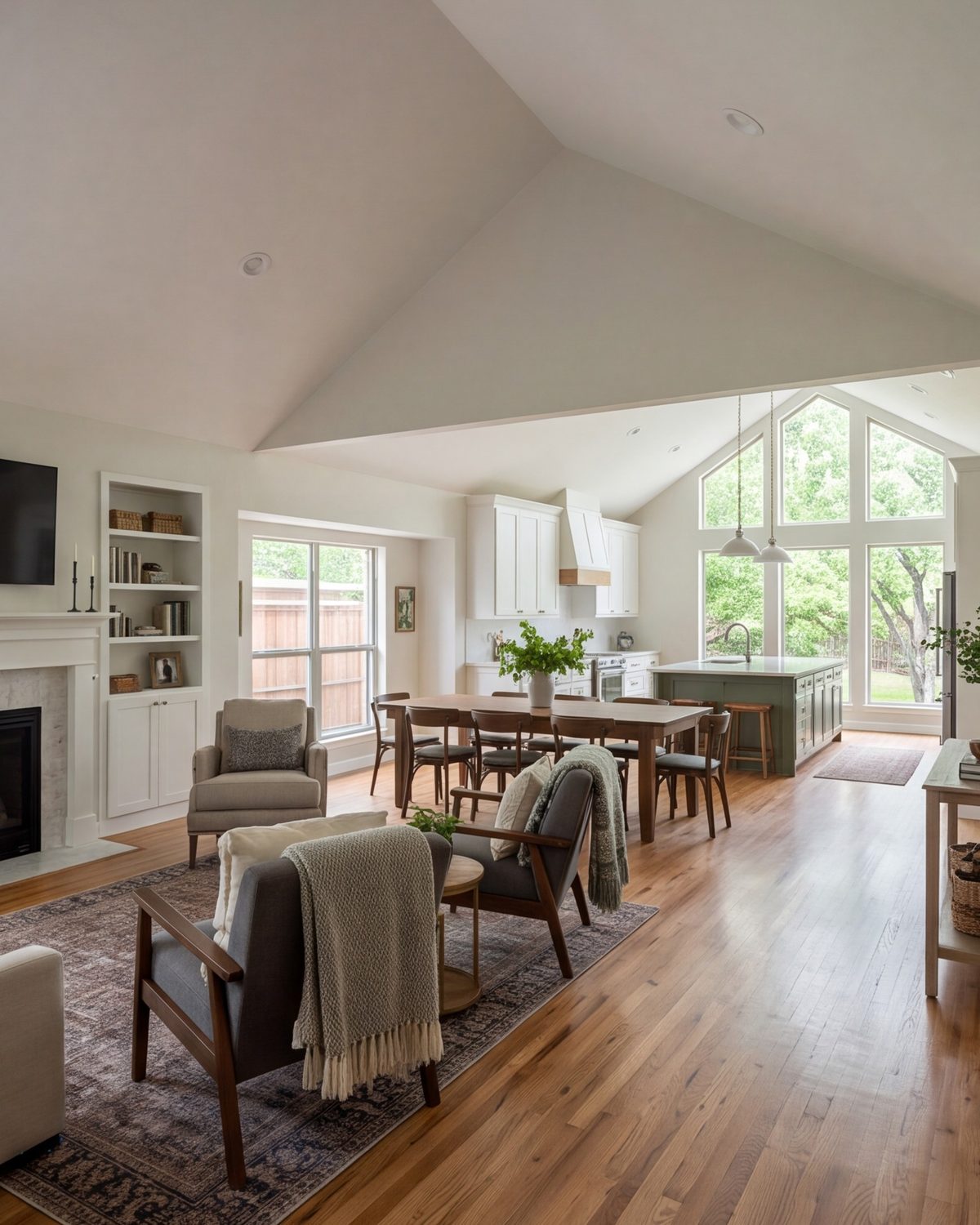 Open-plan living room, dining area and kitchen after a whole-home remodel in a one-story house